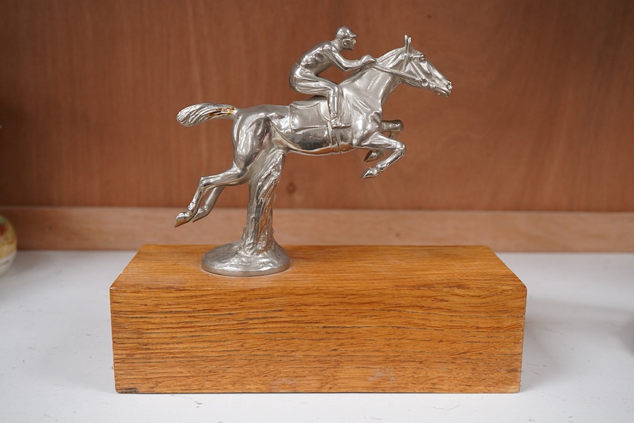 A chrome plated ‘jockey and horse’ car mascot, mounted, 18cm tall